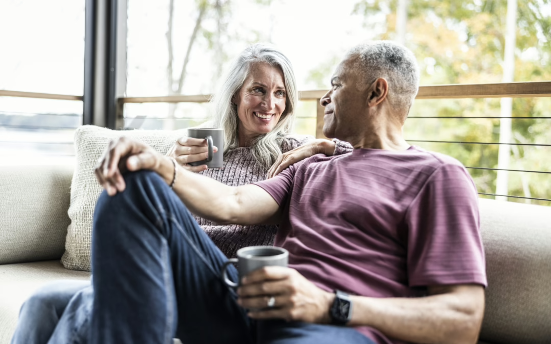 Retired couple on living room couch