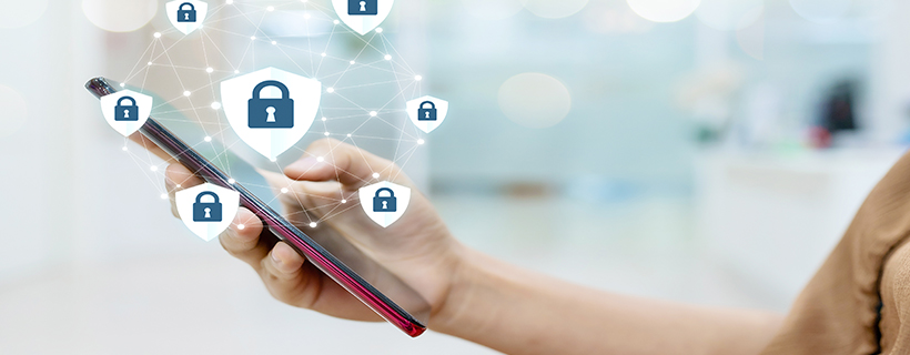 A photo of a person holding a cell phone with a graphic of multiple security symbols overlaid on top