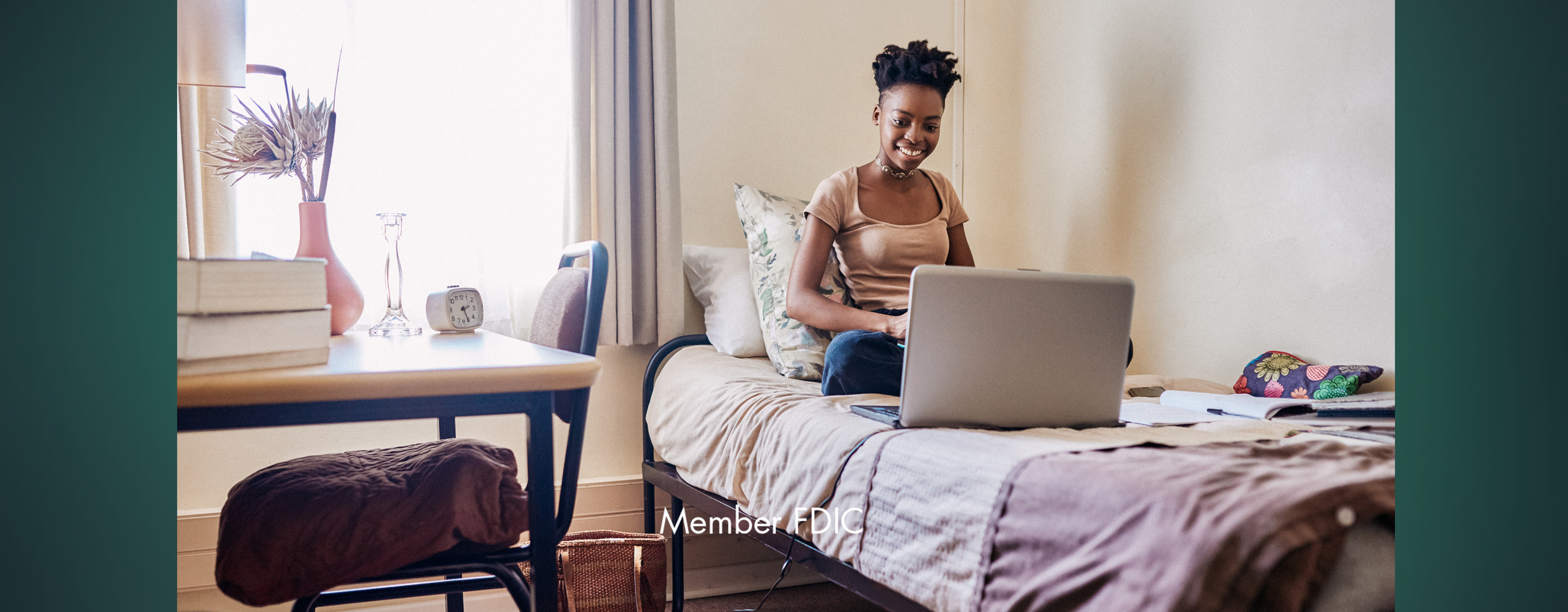 A college student studying in her bedroom